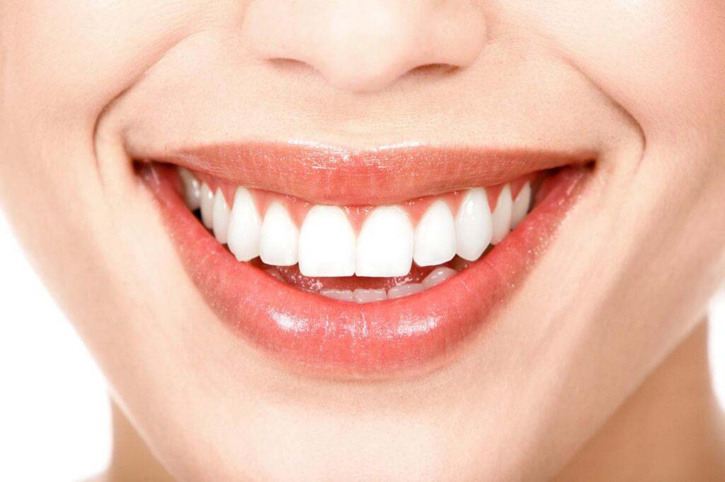 A woman who got 3D printed antimicrobial teeth replacement treatment in St. George, UT